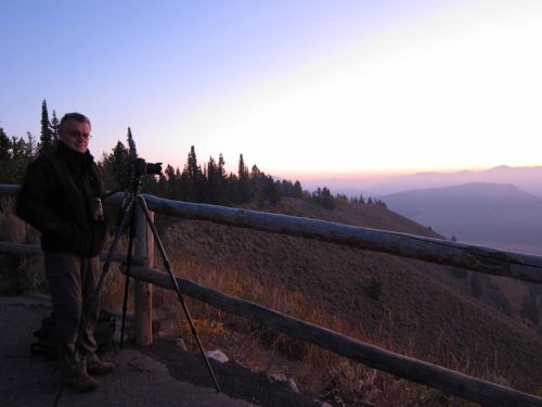 Photographe au lever du soleil