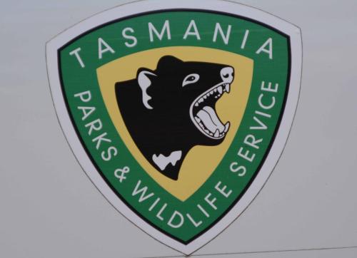 Emblème des services des parcs nationaux de Tasmanie, avec le Diable de Tasmanie 